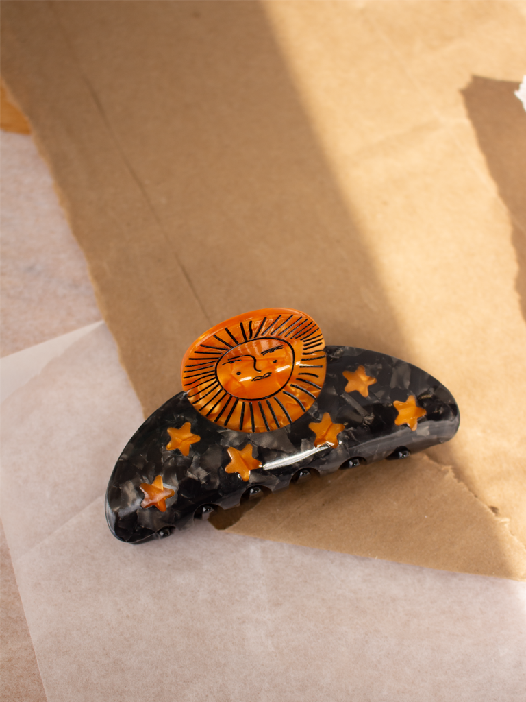 Sol terracota broche